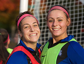 Two athletes smiling Two athletes smiling