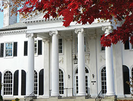 A white building with a tree with red leaves over it. Links to Gifts of Appreciated Securities A white building with a tree with red leaves over it. Links to Gifts of Appreciated Securities