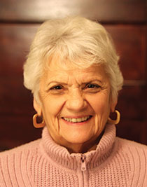 Anne Demchak ’04. Links to her story